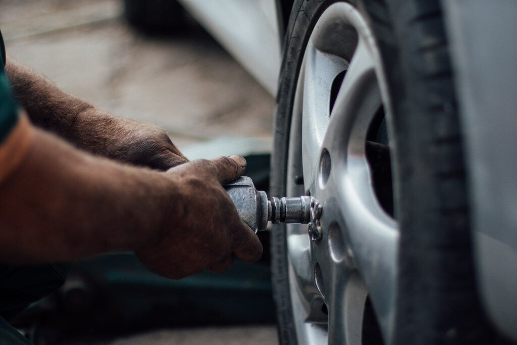 Tire technician changing a wheel